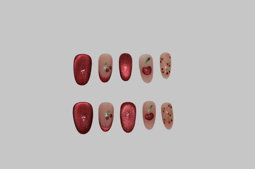 Set of cherry red cat eye nails on white background