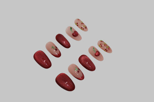 Set of cherry red cat eye nails on white background