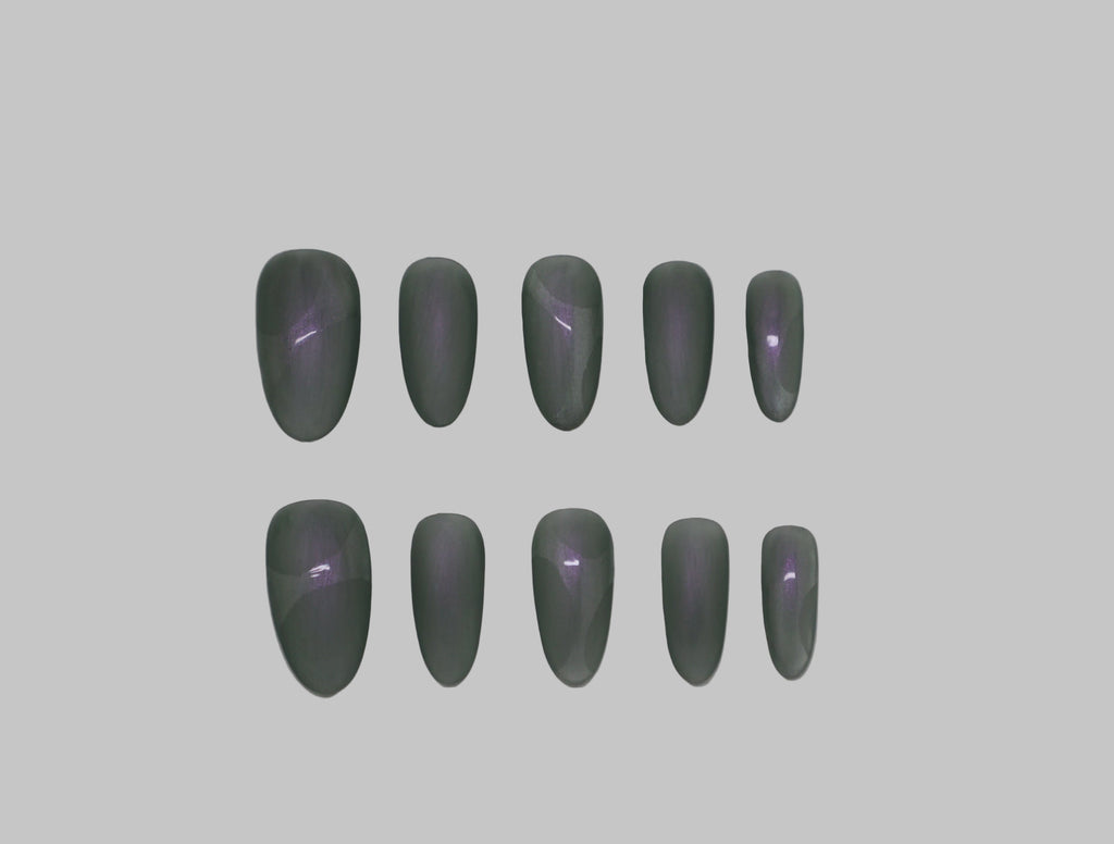 Green and Purple matte iridescent nails on white background