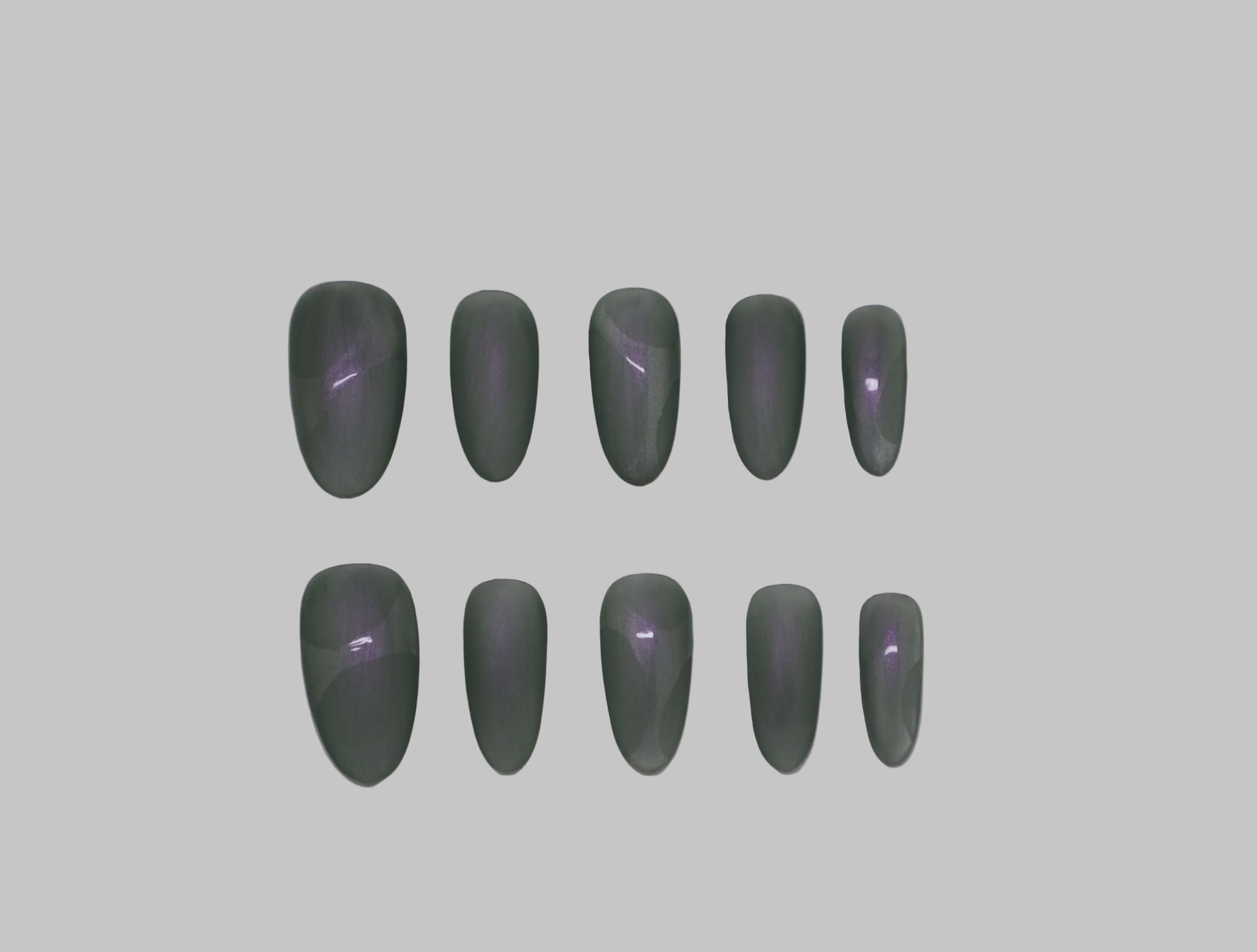 Green and Purple matte iridescent nails on white background