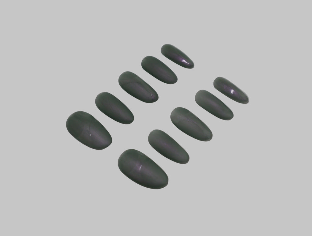 Green and Purple matte iridescent nails on white background