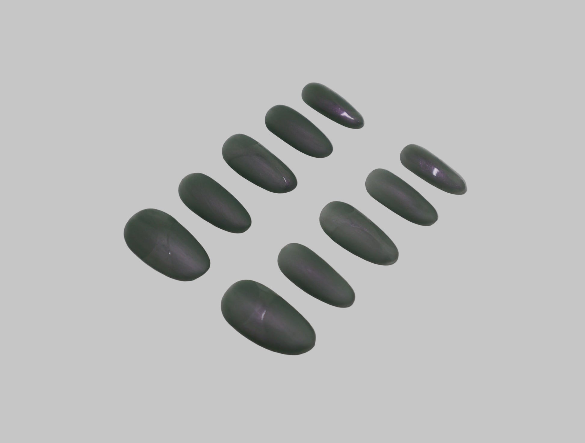 Green and Purple matte iridescent nails on white background